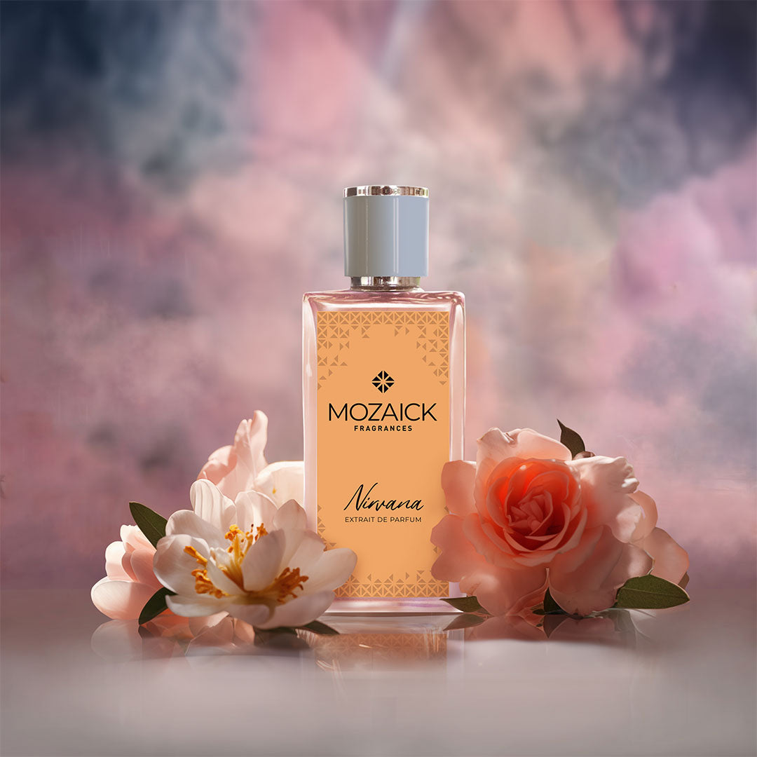 NIRVANA Extrait de Parfum 50 ml by MOZAICK – bottle with a pink rose and a white flower against pink clouds